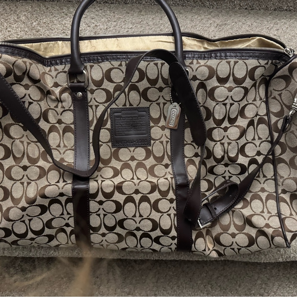 Coach duffle bag khaki/brown w/strap slight wear/tear. - Picture 7 of 14